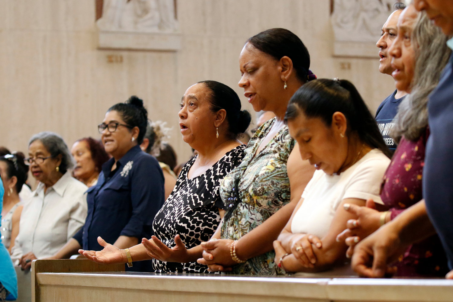Worshippers pray during a Spanish-language Mass for immigrants July 13, 2019, at St. Frances Xavier Cabrini Shrine in New York City. The liturgy was part of the shrine’s daylong celebration marking the birthday of its patroness. An Italian immigrant born July 15, 1850, Mother Cabrini was the first U.S. citizen to be canonized and is the patron saint of immigrants.